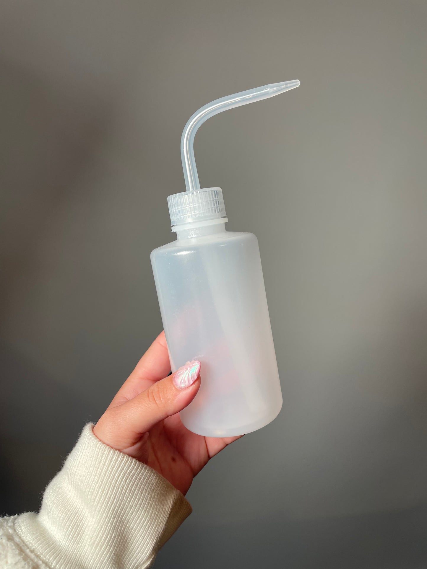Plastic squeeze bottle